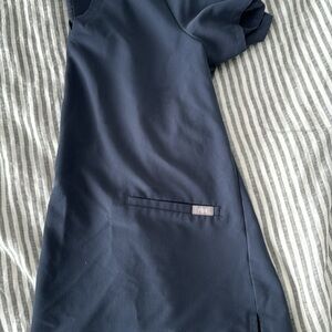 Figs Scrub top size S, color is midnight.